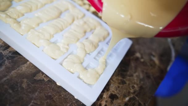Pouring Melted White Chocolate Miniature Chocolate Bar Mold Chocolate Production — Stockvideo