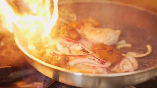 Moving Flaming Pan Flip Pork Tenderloins Onions High Heat Stove — Stock Video