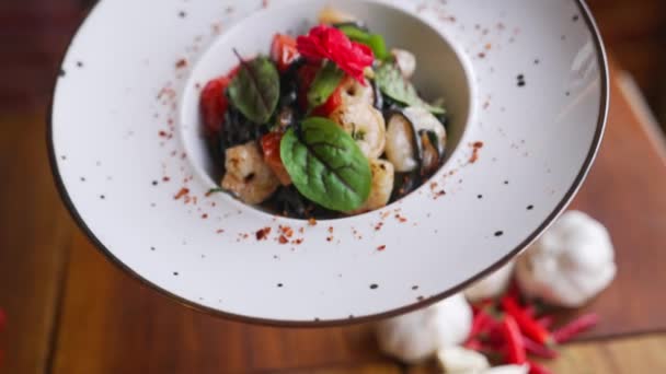 Black Taglioni Pasta Shrimps Served Big White Plate Wooden Table — Stock Video