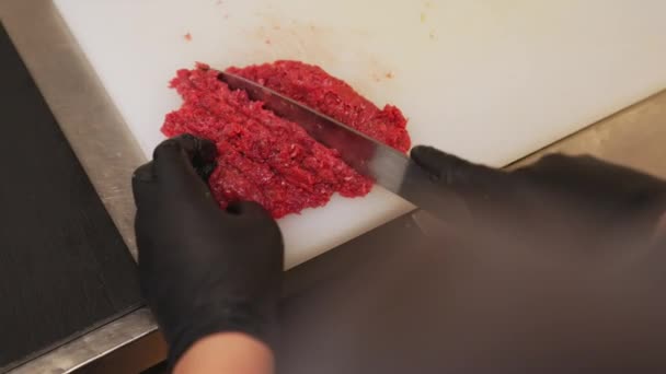 Chef Prepares Beef Tatar Mincing Beef Sharp Knife White Marble — Stock Video