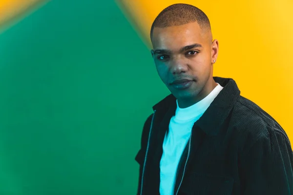 Stock image Young African American man studio portrait through square green glass. High quality photo