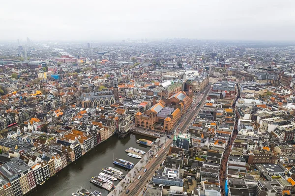 stock image Amsterdam Center tightly woven network of canals and overlapping micro-neighborhoods each bursting with their own unique vibe and history. High quality photo