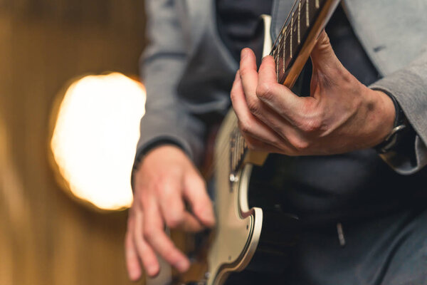 Young musicians practising the song in rehearsal room. High quality photo