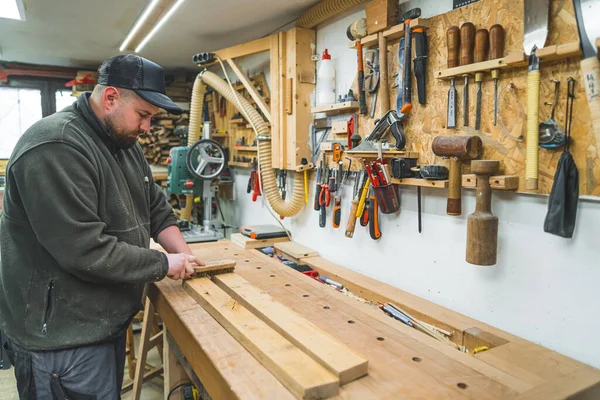 Carpenter Removing Wood Shavings Planks Using Brush Woodworking Studio High — Stock Photo, Image