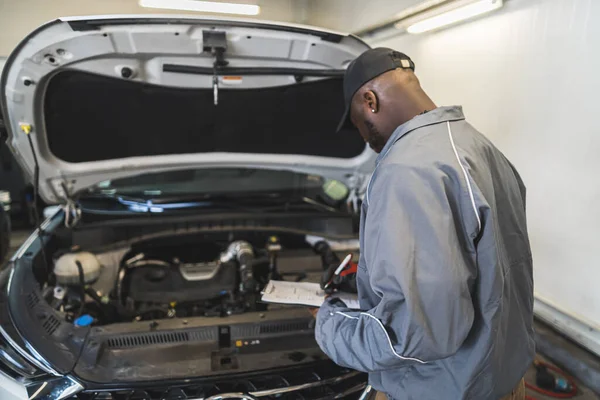 Mechanic Checking Car Engine Open Hood Service Shop High Quality — Stock Photo, Image