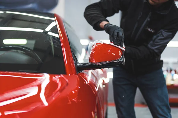 Car Wrapping Specialist Protective Gloves Wrapping Red Cars Side Mirror — Stock Photo, Image