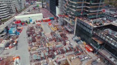 Drone flying over skyscraper building site in Netherlands. High quality 4k footage
