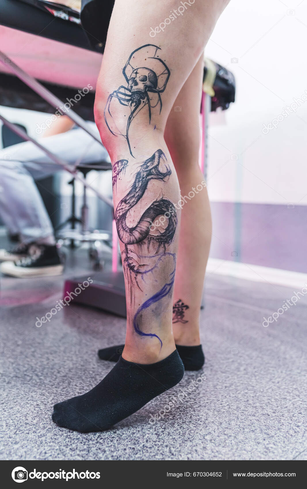 Tattooed Legs Caucasian Middle Aged Client Showing Her Legs Skull Stock  Photo by ©PoppyPix 670304652