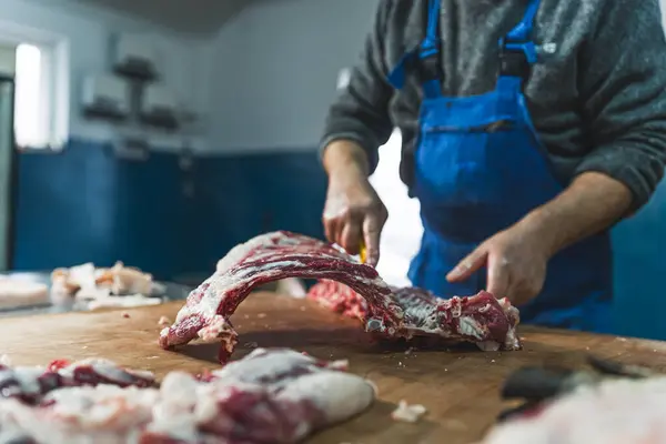 Meat industry slaughterhouse and food processing, butcher at the shop. High quality photo