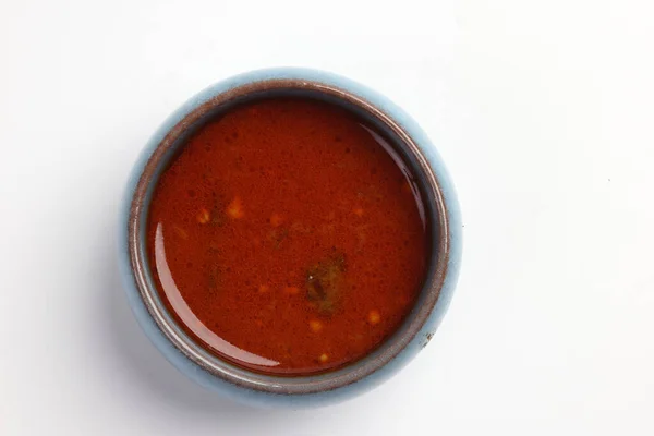 stock image Spicy extremely hot condiment sauce gravy side for Asian dishes sambal blachan geragau krill tomato garlic chilli in small sauce dish 