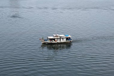 ships boats fishing trollers on ocean sea water of south China sea bay kota Kinabalu sabah 