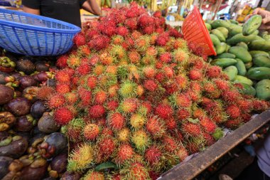 Early morning products and produce at Malaysian wet market selling fish beef chicken fruit vegetable grocery  clipart