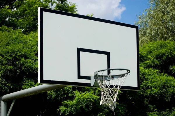 Basketball basket outside in the park.