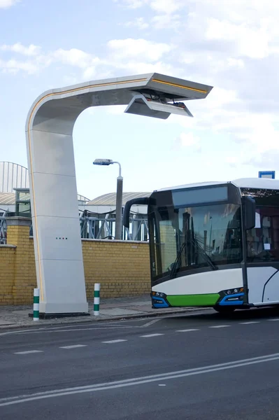 Electric bus at a charging station.