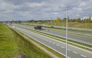 Poznan, Poland - October 2th 2022 - Polish A2 motorway with cars and trucks.