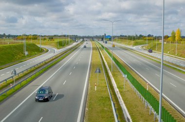 Poznan, Poland - October 2th 2022 - Polish A2 motorway with cars and trucks.