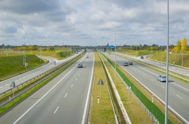 Poznan, Poland - October 2th 2022 - Polish A2 motorway with cars and trucks.