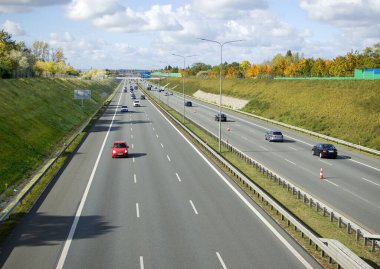 Poznan, Poland - October 9th 2022 - Polish A2 motorway with cars and trucks.