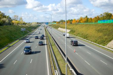 Poznan, Poland - October 9th 2022 - Polish A2 motorway with cars and trucks.
