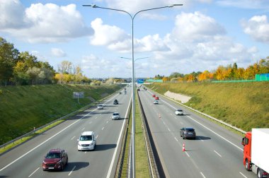 Poznan, Poland - October 9th 2022 - Polish A2 motorway with cars and trucks.