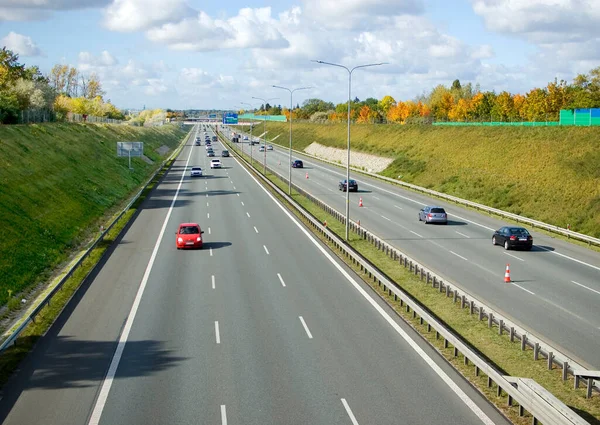 Poznan, Poland - October 9th 2022 - Polish A2 motorway with cars and trucks.