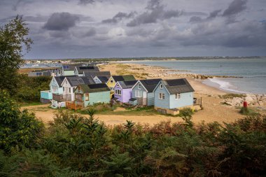 Mudeford Sandbank, Dorset, England, UK - September 27, 2022: View of the beach huts and beach clipart