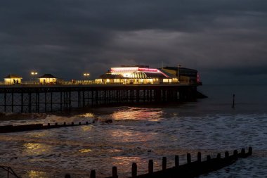 Cromer, Norfolk, England, UK - November 18, 2022: The pier at night clipart