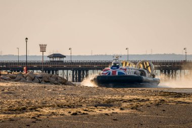 Ryde, Isle of Wight, England, UK - April 20, 2023: The hovercraft arriving at low tide clipart
