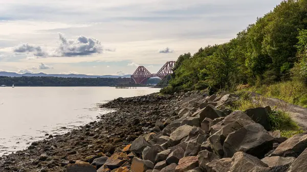 Stock image The River Forth and the Forth Bridge, seen from Inverkeithing Beach, Fife, Scotland, UK