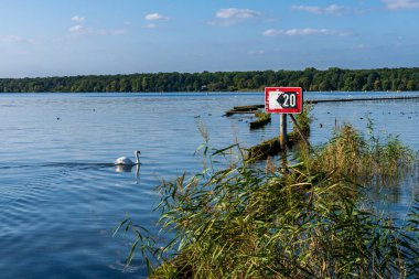 A sign on the shore of the Mueggelsee in Berlin, Germany clipart