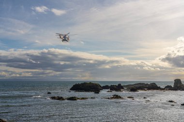 St Monans, Fife, Scotland, UK - September 14, 2023: A coastguard rescue helicopter clipart