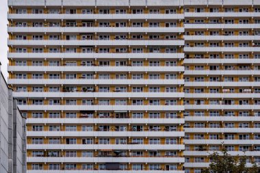 Berlin, Germany - September 13, 2021: Facade of a high-rise building with balconies in Berlin-Marzahn clipart