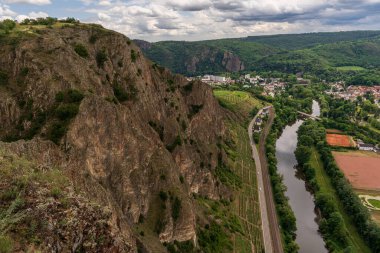 Near Bad Muenster am Stein, Rhineland-Palatine, Germany - August 29, 2021: View from the Rotenfels towards Bad Muenster and Ebernburg clipart