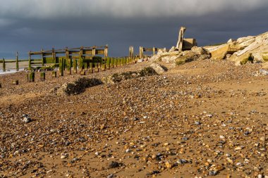 A storm approaching on the beach in Atherington, West Sussex, England, UK clipart