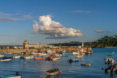 St Ives, Cornwall, England, UK - May 30, 2022: View of the boats in St Ives harbour clipart