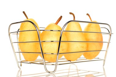 Several organic yellow pears in a wire basket, close-up, isolated on white.
