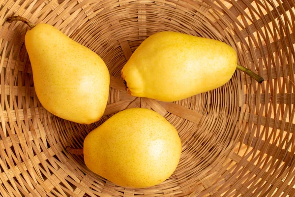 Three Ripe Yellow Pears Wicker Basket Close Top View — Foto de Stock