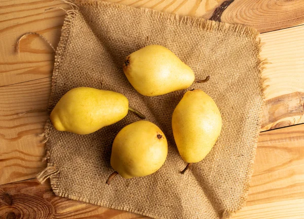 Several Ripe Yellow Pears Jute Napkin Wooden Table Close Top — ストック写真