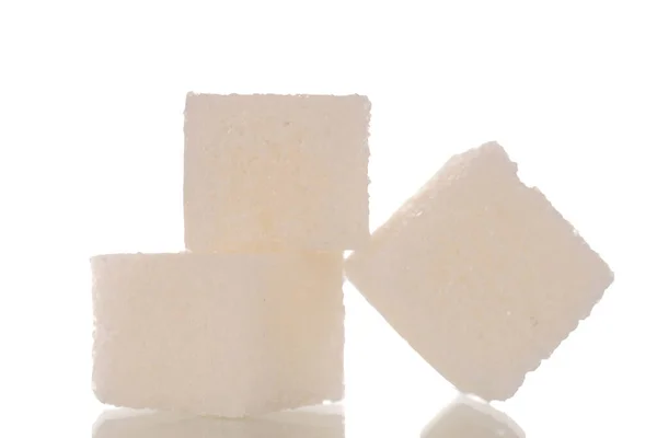 Três Cubos Açúcar Branco Macro Isolados Sobre Fundo Branco — Fotografia de Stock
