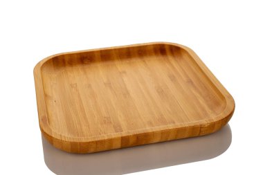 Bir bambu tepsisi, makro, beyaz arka planda izole edilmiş..