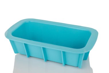 Bir silikon pişirme kalıbı, makro, beyaz arka planda izole edilmiş..