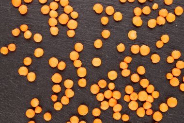 Kırmızı mercimek, kayrak taşı, makro, üst manzara..