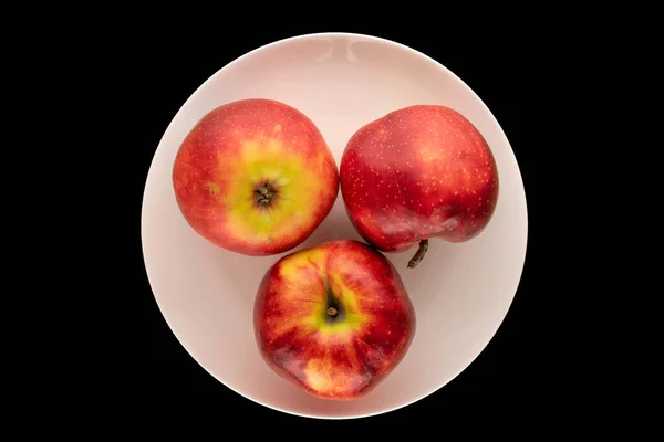 Three Red Apples Ceramic Plate Black Background Macro Top View — Stock Photo, Image