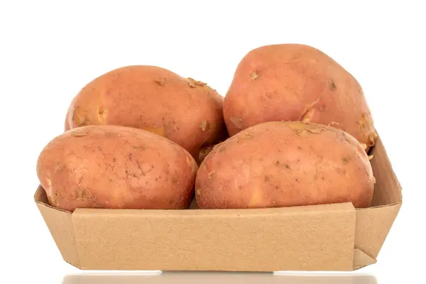 Αρκετές Οργανικό Ροζ Ακατέργαστες Πατάτες Ένα Πιάτο Χαρτί Μακροεντολή Απομονώνονται — Φωτογραφία Αρχείου