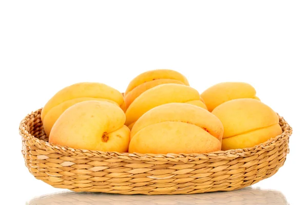 Several Organic Yellow Apricots Straw Plate Macro Isolated White Background — Stock Photo, Image