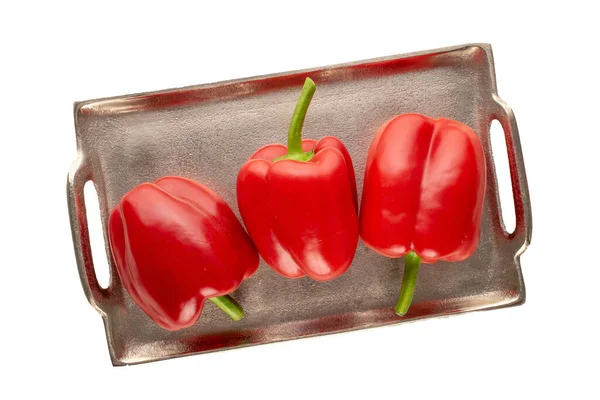 Three Sweet Red Peppers Metal Tray White Background Macro Top — Stock Photo, Image