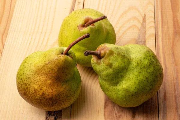 Three Juicy Pears Macro Wooden Table Stock Picture