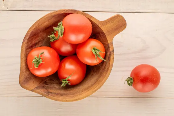 Several Cocktail Tomatoes Wooden Cup Wooden Table Macro Top View — Stock Photo, Image