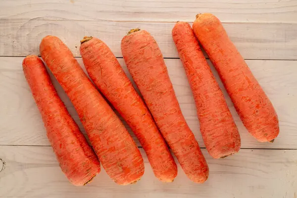 Several Ripe Carrots Wooden Table Macro Top View — Stock Photo, Image