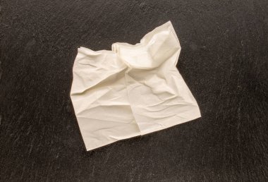 Kağıt üzerinde kuru peçete, makro, üst görünüm.